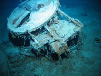 S1 stbd forward 4-inch HA Gun and mount inverted on seabed